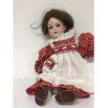 An Early 20th century Armand Marseille bisque doll