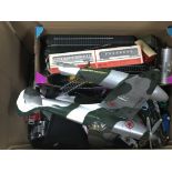 A collection of play worn cars and airplanes including some die-cast in two boxes. (2)