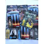 A collection of movie action figures, all carded (