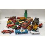 A collection of play work toys including Dinky and