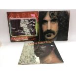 Three Frank Zappa LPs comprising 'Joe's Garage' (d
