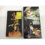 Two 4CD box sets comprising 'Bonfire' by AC/DC and