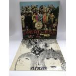 Two Beatles LPs comprising a first UK mono pressin