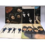 Five Beatles LPs comprising'Help!', 'Abbey Road' a