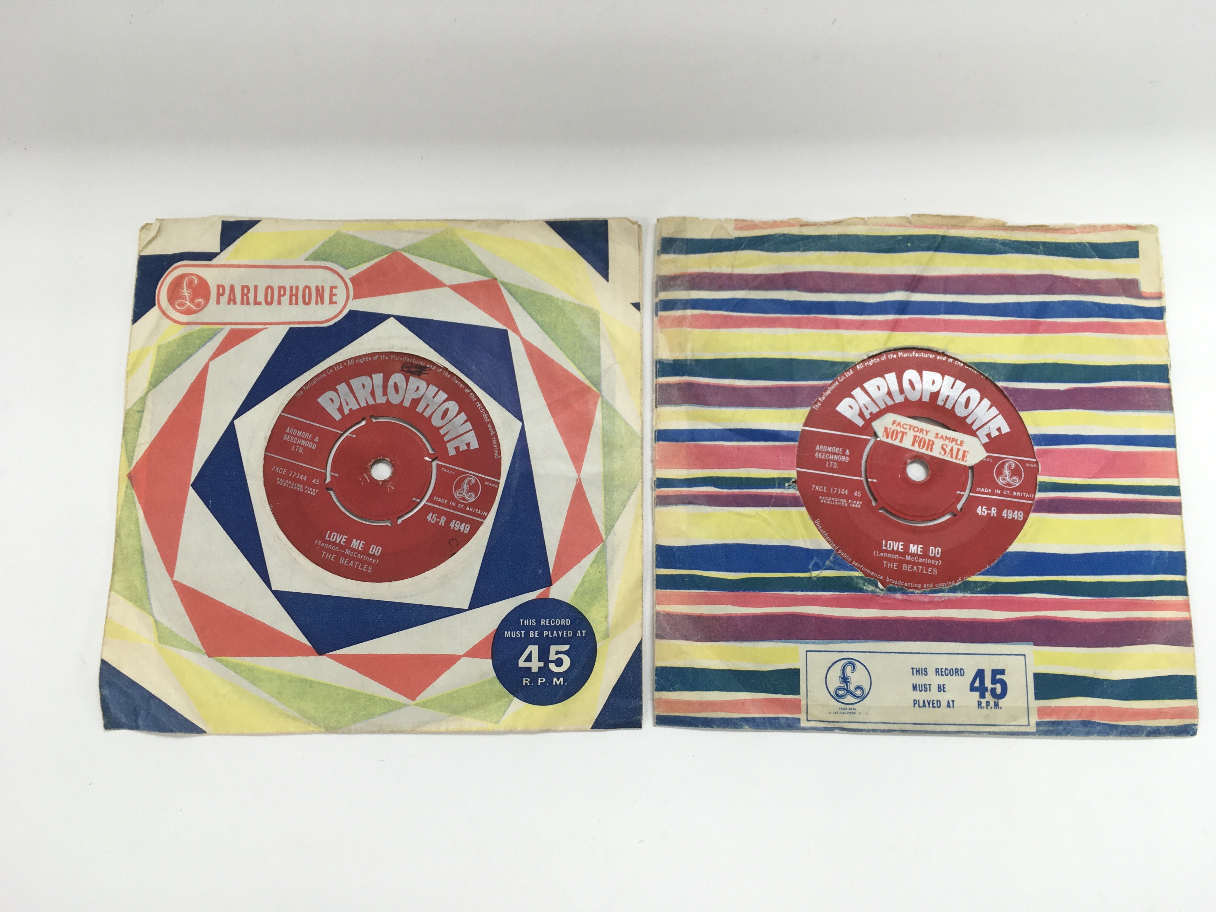 Two early UK issues of The Beatles single 'Love Me