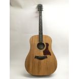 A Taylor 110GB acoustic guitar, serial number 2003