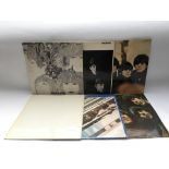 Six early UK pressings of Beatles LPs including a