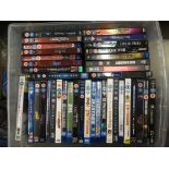 Four boxes of Blu Rays and DVDs including various