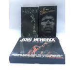 Three Jimi Hendrix CD / video box sets.