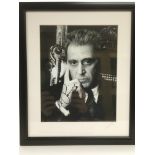 A framed and glazed signed photo of Al Pacino, app