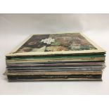 A collection of LPs by various artists including T