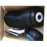 A collection of 7 inch singles by various artists