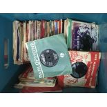 A crate of LPs and 7 inch singles by various artis