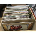 Two boxes of LPs and 12 inch singles by various ar