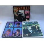 Three Beatles 12x12 CD box sets each comprising in