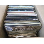 A box of LPs and 78s by various artists including