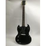 A left handed USA Gibson SG Junior electric guitar