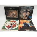 Four prog rock LPs by various artists including Ur