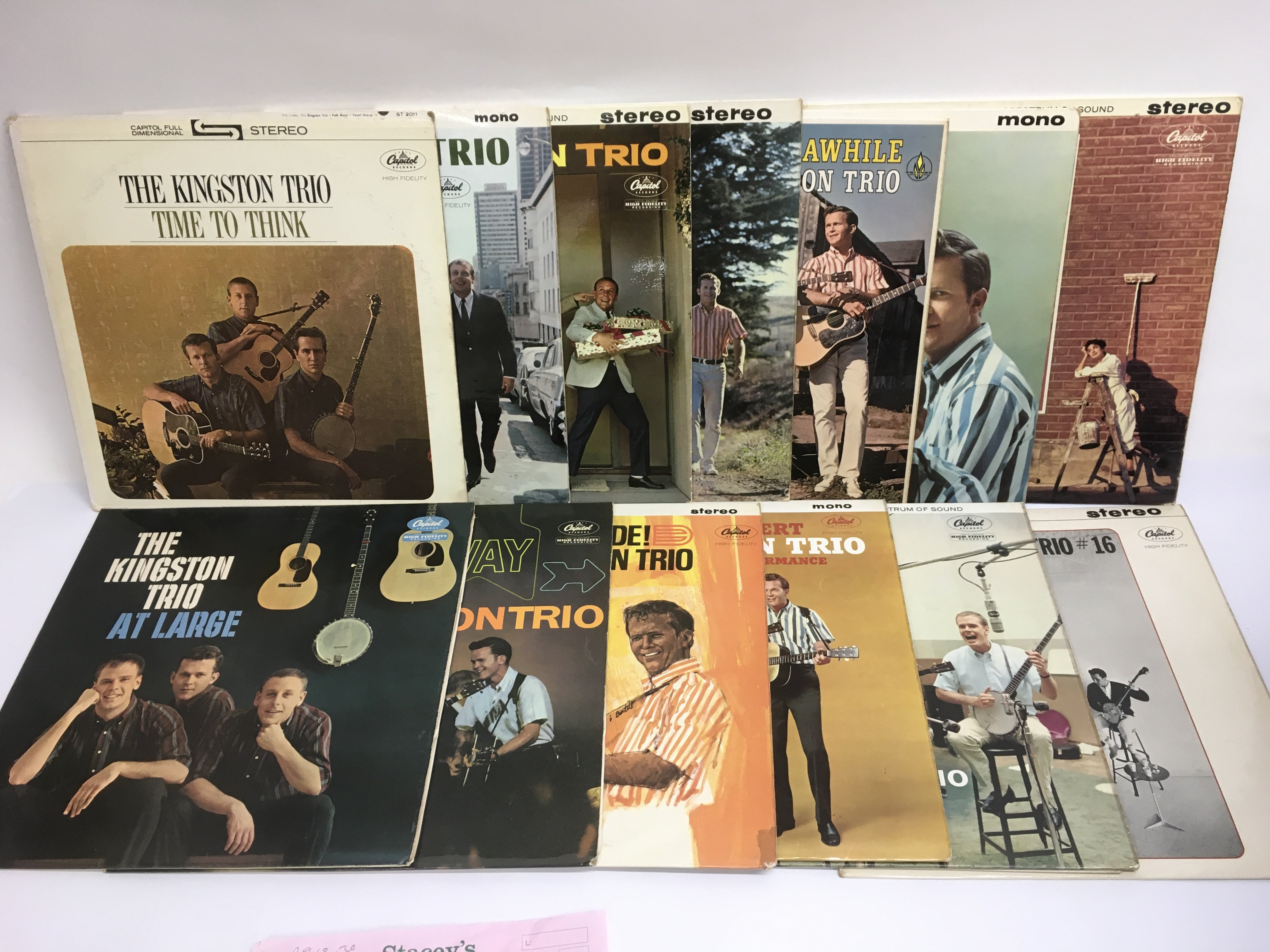 A collection of LPs by The Kingston Trio together