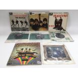 A collection of Beatles EPs and 7 inch singles inc