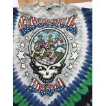 A collection of Grateful Dead tour T-shirts size x