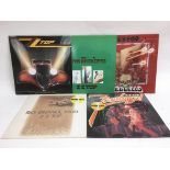 Four ZZ Top LPs including 'Rio Grande Mud', 'Elimi