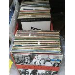 Two boxes of LPs and. 12 inch singles by various a