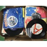 A collection of 7 inch singles by various artists