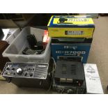A collection of CB radio items including a boxed I
