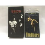 Two CD box sets of The Doors.
