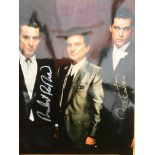 A signed photographic print of the three main char