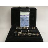 A cased and as new Yamaha clarinet with accessorie
