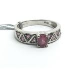 A 9ct white gold and pink sapphire ring, approx 3.