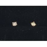 A pair of 18ct rose gold four claw RBC diamond sol