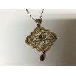 A vintage 9carat gold brooch pendent set with amet