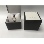 A boxed ladies Gucci diamantissima wrist watch