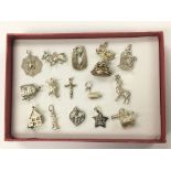 A collection of approx 15 silver charms and pendan