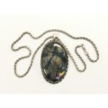 A large silver and Labradorite pendant on heavy ch