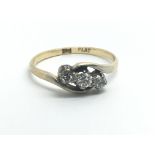 A 1950s 18ct yellow gold and three stone diamond r