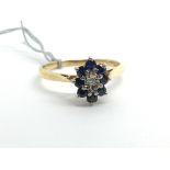 An 18ct yellow gold sapphire and diamond cluster r