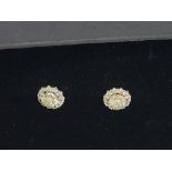A pair of 18ct white-gold fancy yellow diamond hal