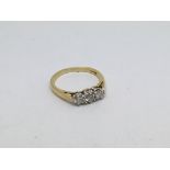 An 18ct gold ring set with 3 diamonds approx 0.5ct