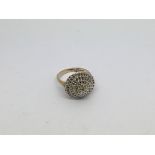 A 9ct gold ring set with a diamond cluster approx