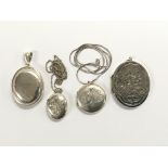 A collection of silver and silver plated lockets a