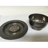 A silver bowl with London hallmarks and a silver d