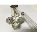 A small silver tankard a condiment set and a silve