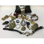 A small qty of costume jewellery and watches.