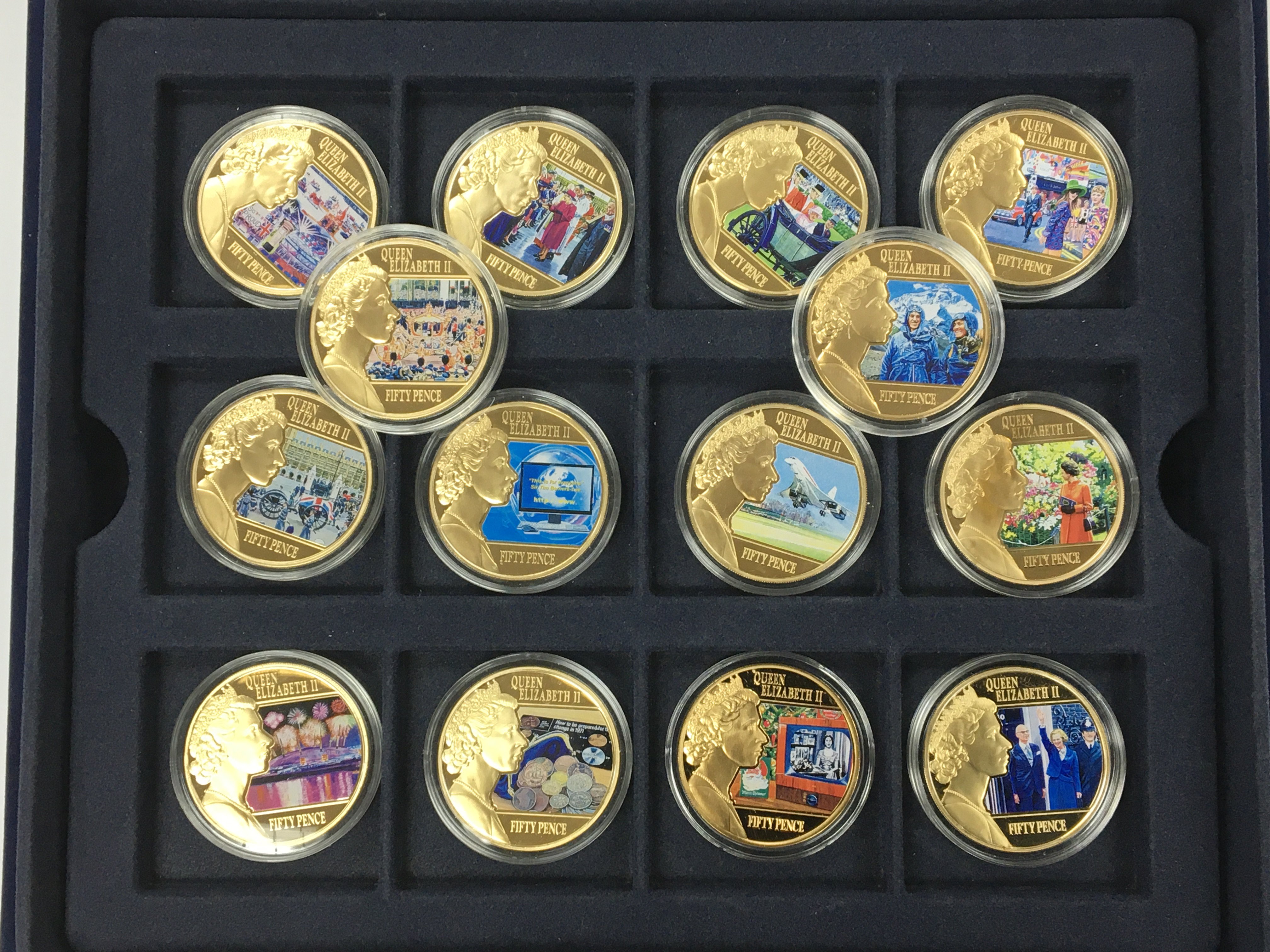 A cased set of 26 Commemorative coins