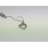 A 9ct white gold heart shaped approx 0.15ct diamon