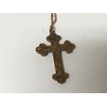 A 9carat gold cross and chain weight 3.5g